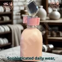 Thumbnail for Melina for Women Eau de Parfum pink bottle with pink fabric bow and clear faceted crystal style cap