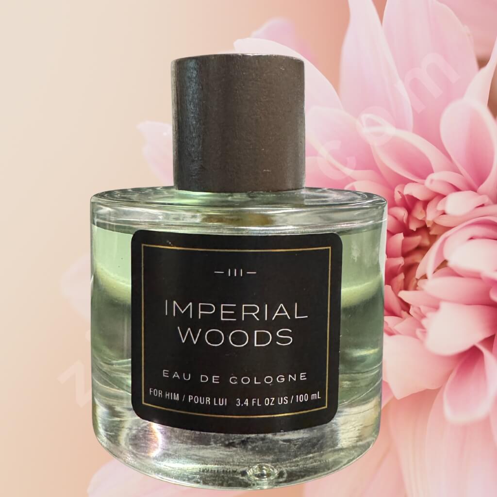 Bottle of Imperial Woods Eau de Cologne with a pink flower in the background