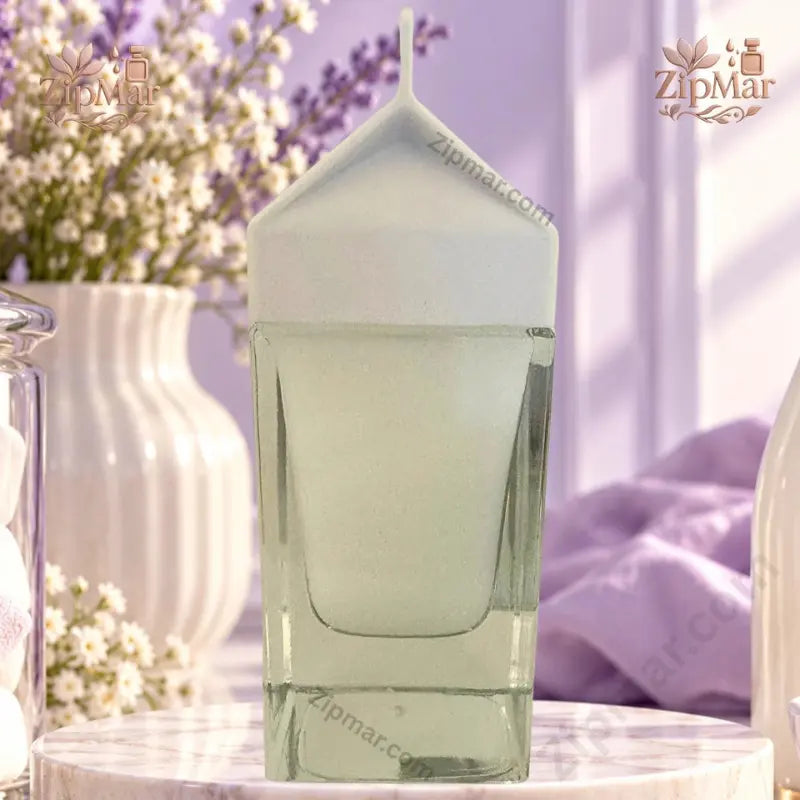 MIIM MIIC Marshmallow Miilk Eau de Parfum 3 oz milk carton-shaped glass bottle with white peaked cap side view