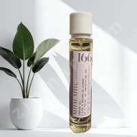 Thumbnail for Bottle of 166 perfume with a plant on a white background