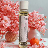 Thumbnail for Perfume bottle labeled '166' with pink flowers in the background