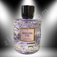 Thumbnail for Perfume bottle labeled 'Modern Fig' with a geometric design on a gradient background