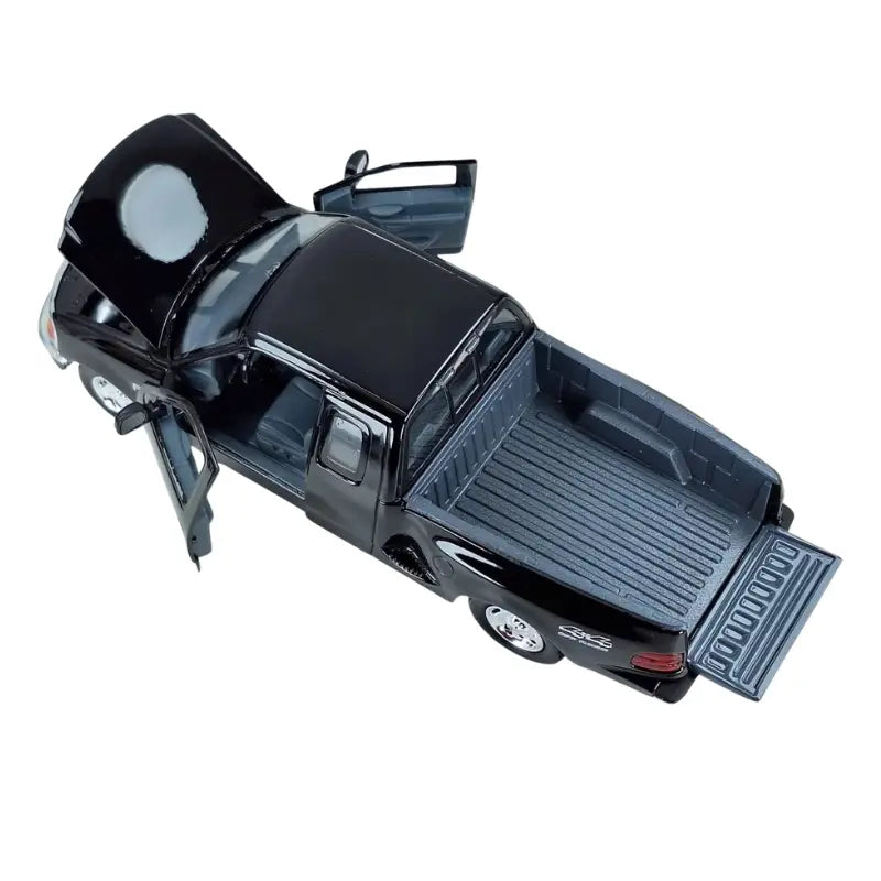 Top angle view of Motormax Ford F150 with doors, hood, and tailgate open
