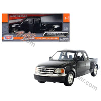 Thumbnail for Motormax Timeless Legends boxed 2001 Ford F150 XLT Flareside Supercab 1:24 black diecast with the truck shown in front of the box