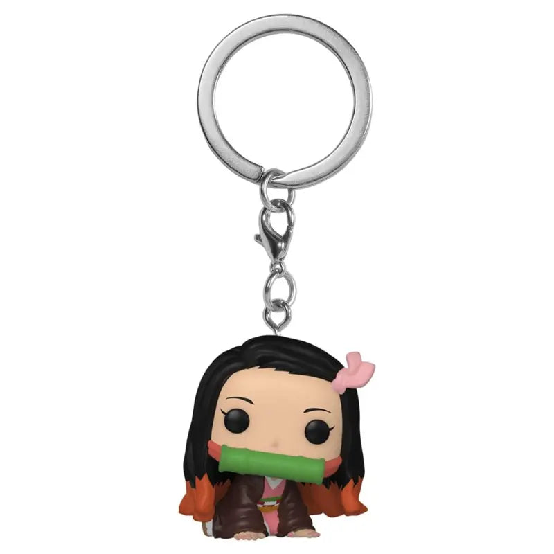 Unboxed close-up of the Funko Pocket Pop! Nezuko Kamado vinyl figure keychain, depicting the character Nezuko in her bamboo muzzle and kimono attached to a metal ring.