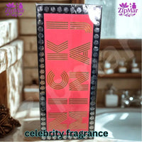 Thumbnail for Side profile of Nicki Minaj Minajesty EDP box with gold typography