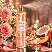Thumbnail for Nicole Miller Champagne Roses Body Mist 8 fl oz being sprayed showing fine fragrance mist with roses peach and coconut