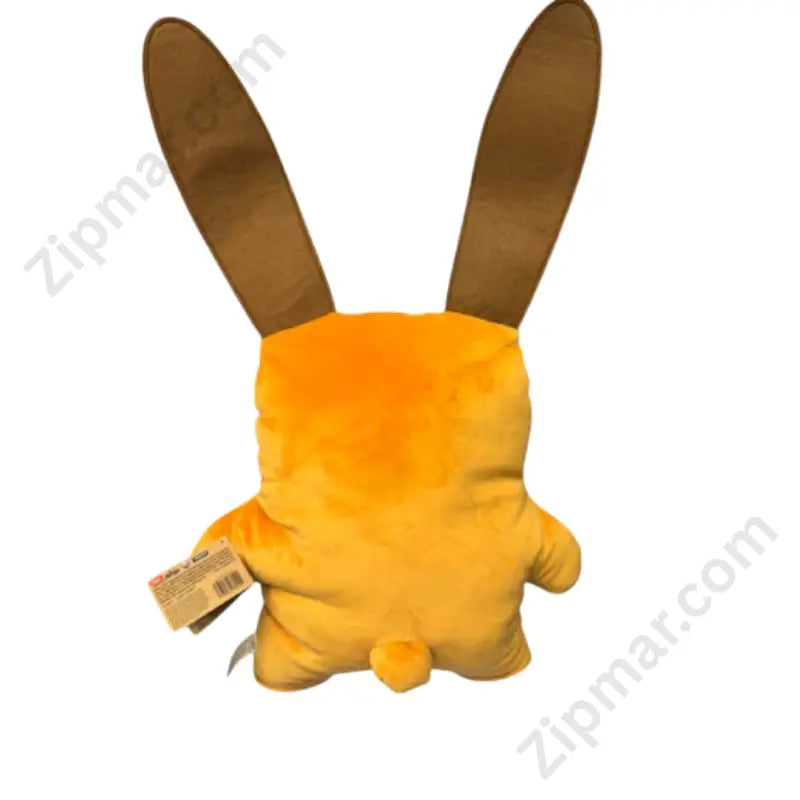 Orange monster plush stuffed animal back view showing tall rabbit ears, small round tail, and hang tag