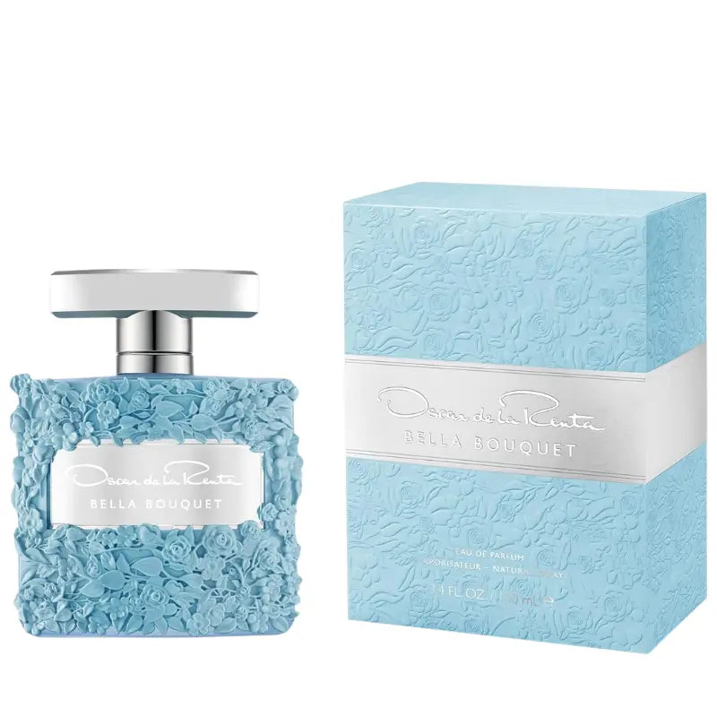 Oscar de la Renta Bella Bouquet Eau de Parfum 3.4 fl oz bottle with 3D floral accents standing beside original embossed light blue box