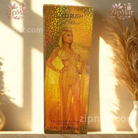 Thumbnail for Side photo of Paris Hilton Gold Rush box featuring Paris Hilton in a golden gown