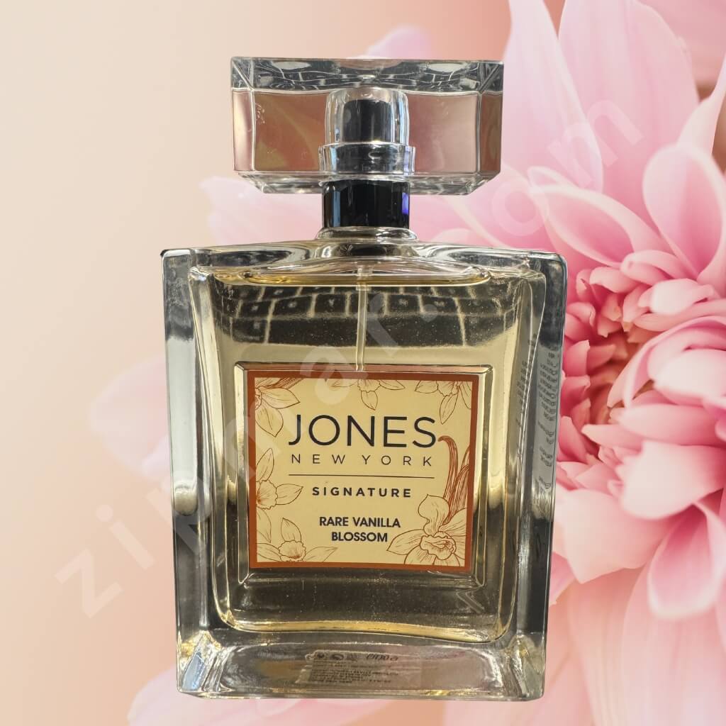 Perfume bottle labeled 'Jones New York' with a pink floral background Women’s vanilla floral fragrance by Jones New York EDP 100m