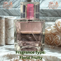 Thumbnail for Pure Crystal for Women Eau de Parfum bottle with pink spray pump on a marble ledge beside roses