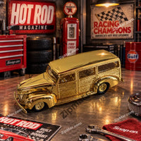 Thumbnail for Front three quarter view of Racing Champions 24K gold plated woody wagon diecast replica