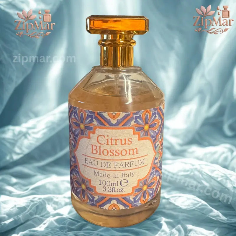 Rudy Profumi Citrus Blossom Eau de Parfum 100ml bottle with gold cap on blue backdrop