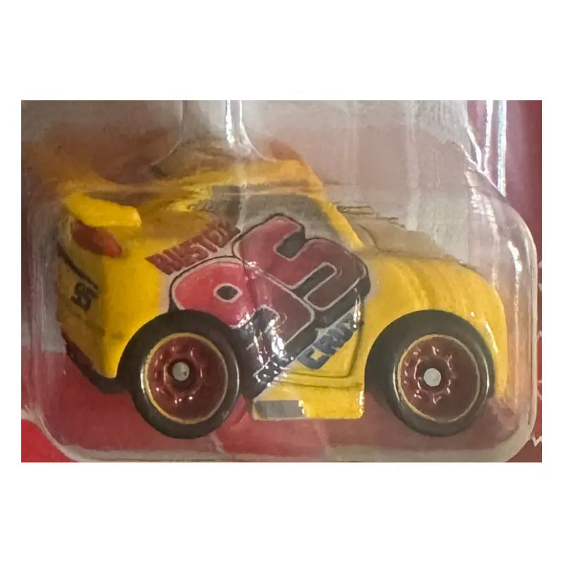 Mattel Disney Pixar Cars Cruz Ramirez in Rust-eze racing livery Mini Racer yellow diecast car close-up