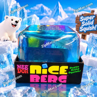 Thumbnail for Schylling NeeDoh Nice Berg stress toy on a desk setting surrounded by blue decorative ice cubes
