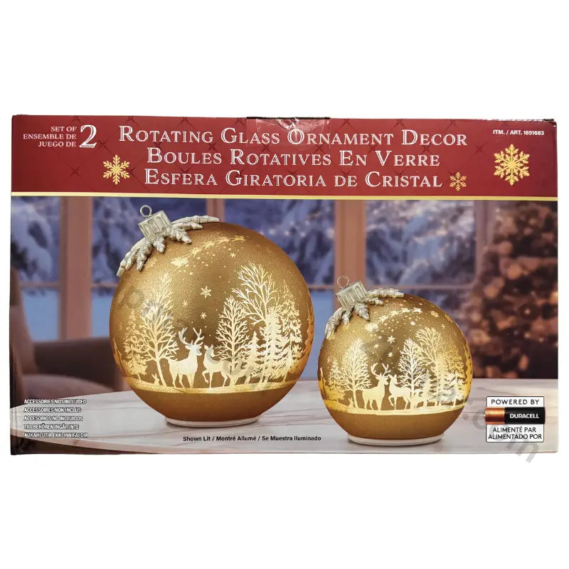 Set of 2 Rotating Glass Ornament Decor box front with two lit gold glass ornaments and Powered by Duracell badge