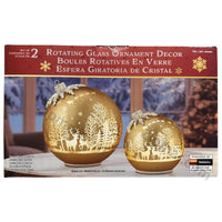 Thumbnail for Set of 2 Rotating Glass Ornament Decor box front with two lit gold glass ornaments and Powered by Duracell badge