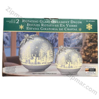 Thumbnail for Set of 2 Rotating Glass Ornament Decor green box front with two lit silver ornaments and Powered by Duracell badge