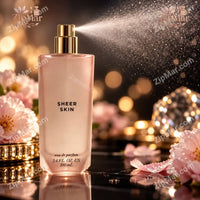 Thumbnail for Sheer Skin Eau de Parfum bottle spraying a fine mist from a gold spray collar