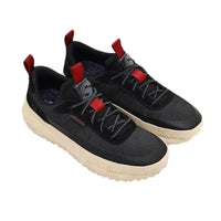 Thumbnail for Angled perspective view of Skechers Classic Fit men's black sneakers with red accents