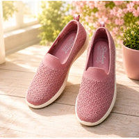 Thumbnail for Skechers GO WALK Lite Enamored women's pink slip-on shoes styled on wooden table