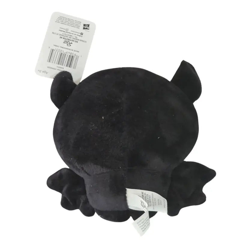 Skelanimals Pink Bonita the Bat plush back view showing wings and UPC barcode tag