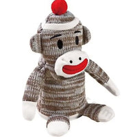 Thumbnail for Sock monkey plush toy in brown and gray knit with a red pom pom hat, white face and red smile, sitting upright