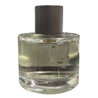 Thumbnail for Close-up of the black and gold Spice Reserve Eau de Cologne label on a clear glass bottle.