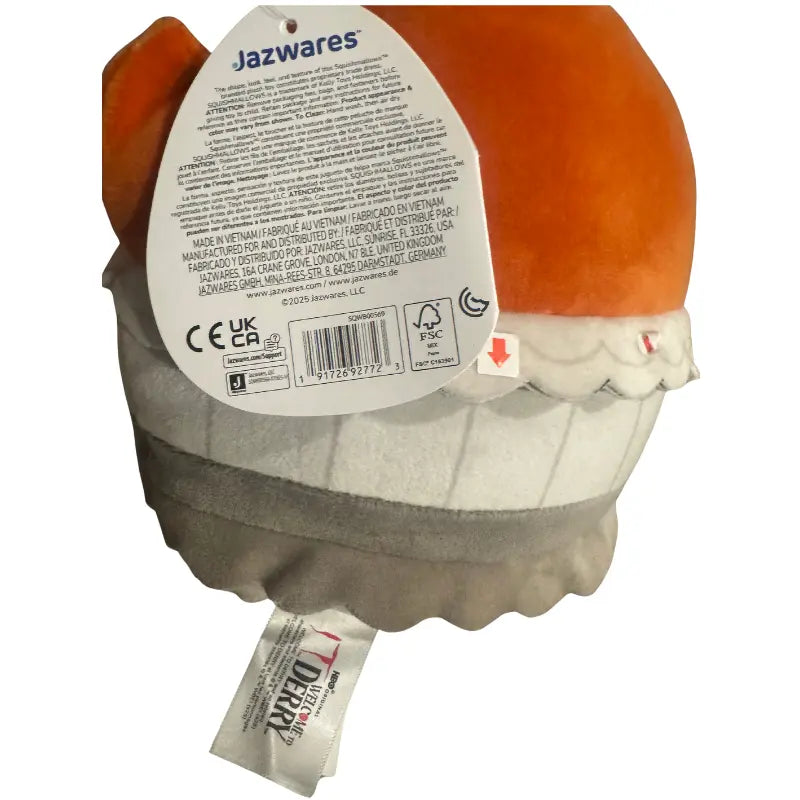 Back view of Squishmallows Pennywise plush showing barcode hangtag (UPC 197126927723) and tush tag