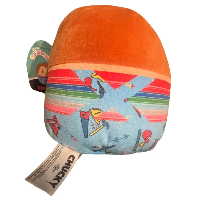 Back view of Chucky Squishmallows plush showing back fabric design and sewn-in tags