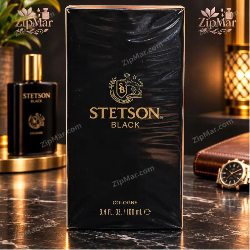 Front view of sealed Stetson Black Cologne 100 mL box with gold lettering and bottle behind