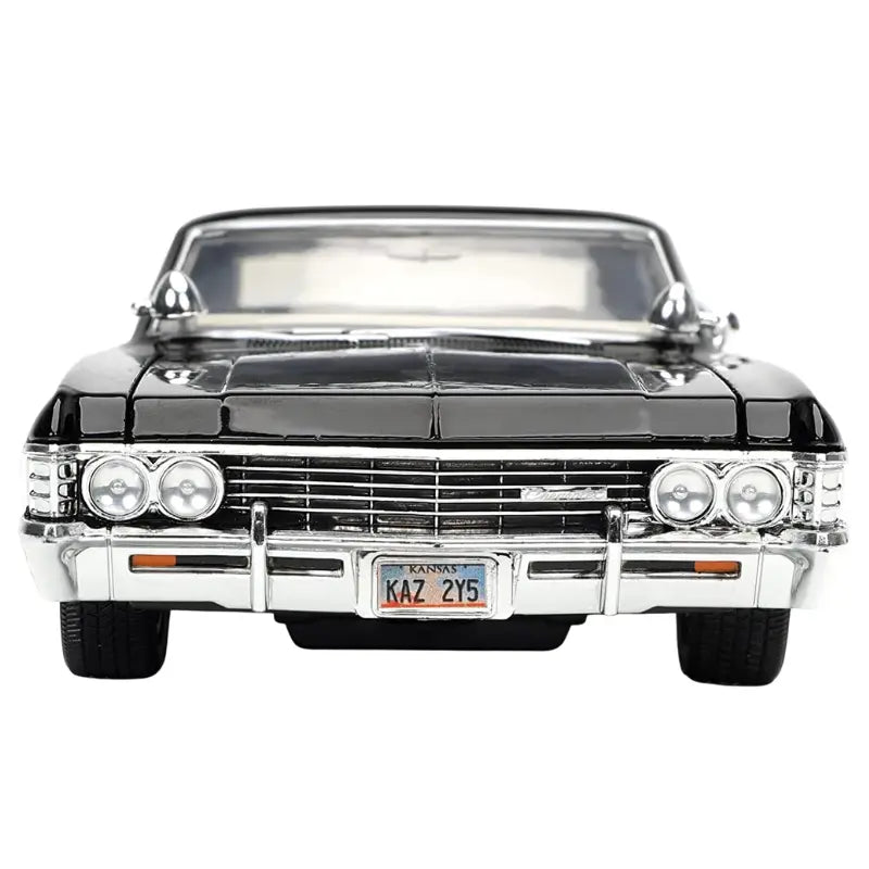 Front view of the 1967 Impala diecast car featuring the KAZ 2Y5 Kansas license plate and chrome grille.