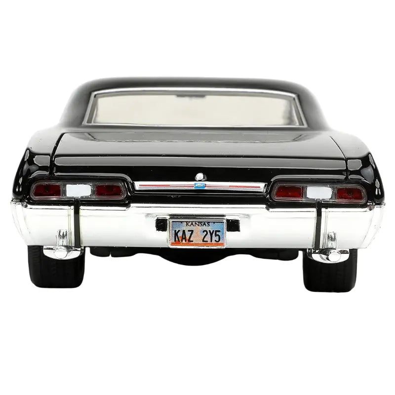 Rear view of the 1967 Chevrolet Impala diecast showing the dual exhaust and authentic Supernatural license plate.
