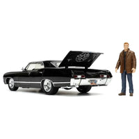 Thumbnail for 1967 Impala diecast car with trunk open revealing the pentagram symbol and Dean Winchester figure standing nearby.