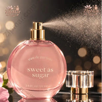 Thumbnail for Sweet As Sugar Eau De Parfum bottle spraying fine fragrance mist with cap off