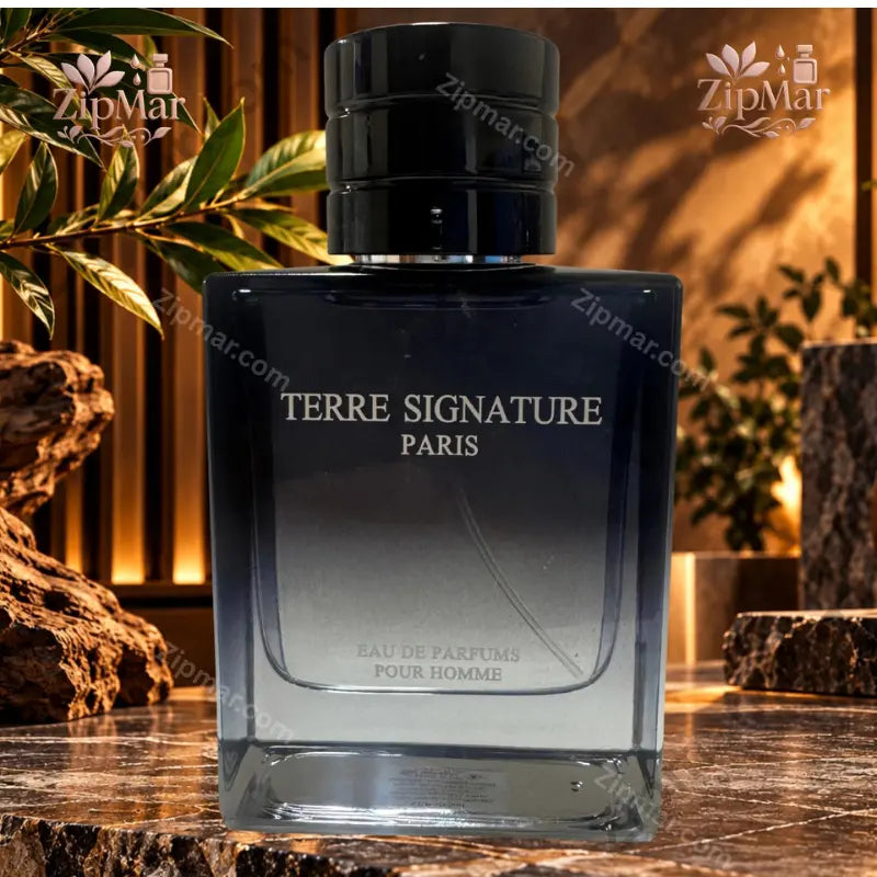 Terre Signature Paris EDP Pour Homme bottle front showing brand name and concentration in dark moody setting
