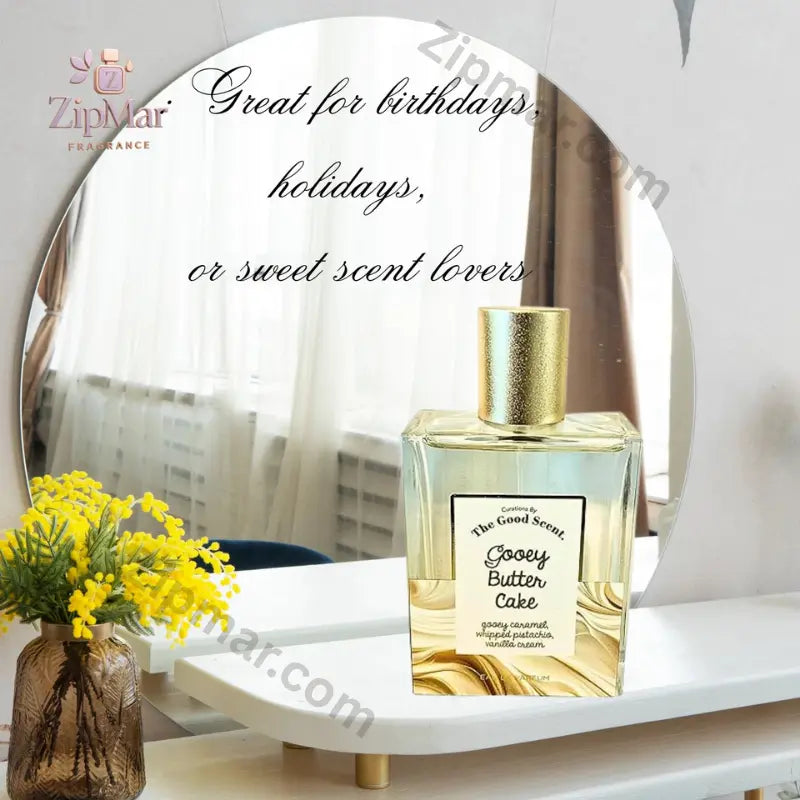 The Good Scent Gooey Butter Cake Eau de Parfum clear square glass bottle with gold cap on a white vanity