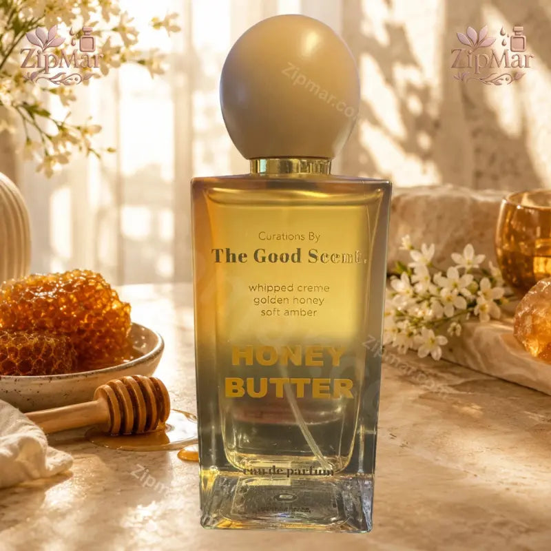 Top-angle display of Honey Butter Eau de Parfum set against smooth whipped cream texture