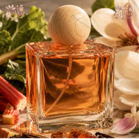Thumbnail for Fine spray mist view from gold nozzle on The Good Scent Rhubarb Magnolia bottle