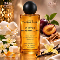 Thumbnail for The Good Scent Whipped Marshmallow Eau de Parfum 3.4 oz bottle beside marshmallows, plum and vanilla flower