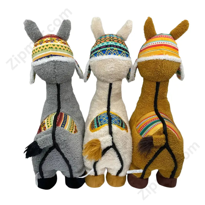 Think Dog Land of Llamas dog chew toy back view showing all three colors gray white and golden with matching saddle blankets