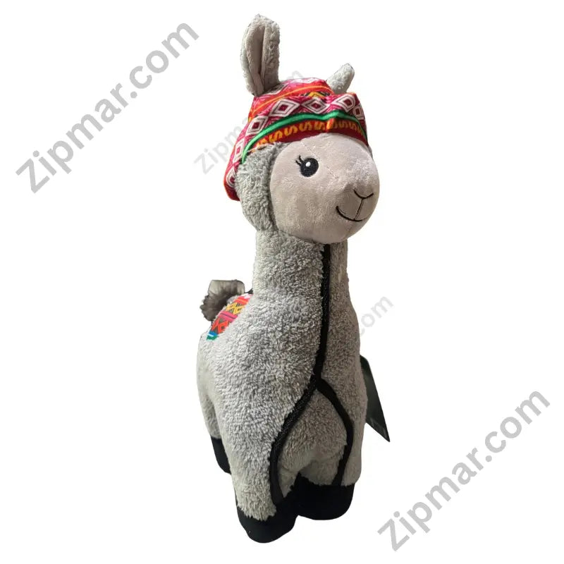 Think Dog Land of Llamas hang tag confirming squeaker and spikey ball inside English, French, Spanish