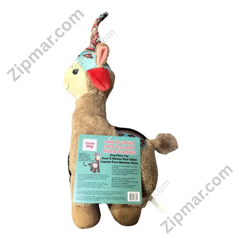 Think Dog Land of Llamas tan llama dog chew toy rear view showing teal Andean saddle, hat detail, and pom-pom tail