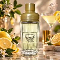 Thumbnail for Tini Perfumes Limoncello Martini Eau de Parfum 3.4 fl oz 100 mL cocktail shaker glass bottle with gold dome cap front view with lemons and martini glass