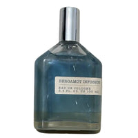 Thumbnail for View showing the detailed ingredient list and batch code label on the bottom of the Tru Fragrance Bergamot Infusion bottle.