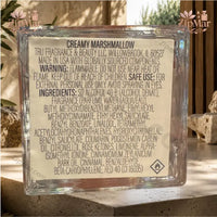 Thumbnail for Close-up spray mist action view from gold atomizer nozzle on Creamy Marshmallow perfume bottle