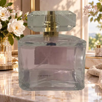 Thumbnail for Tru Fragrance She Said Yes EDP clear glass bottle showing blush-pink liquid and crystal faceted cap
