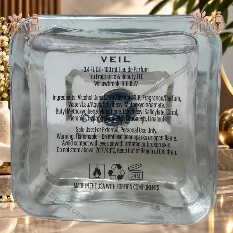 Bottom of Tru Fragrance Element Edition VIII Veil Eau de Parfum 3.4 oz showing manufacturer label — Tru Fragrance & Beauty LLC, Willowbrook IL, Made in USA