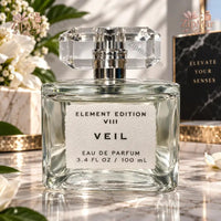 Thumbnail for Tru Fragrance Element Edition VIII Veil Eau de Parfum 100 mL clear rectangular glass bottle with faceted crystal cap front view on marble